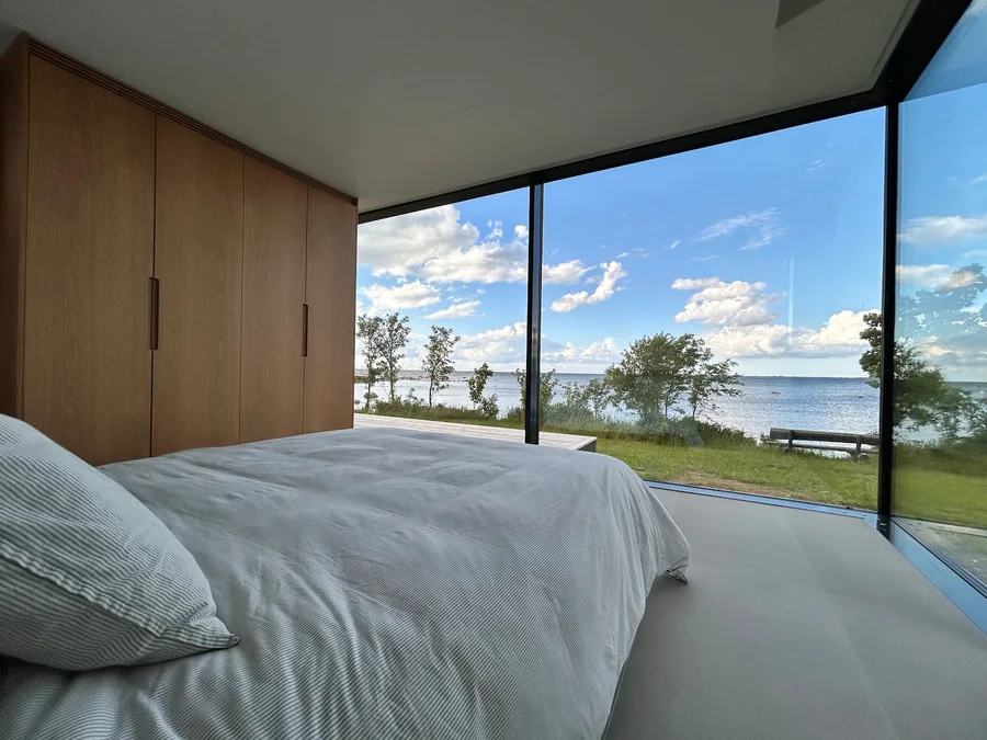Signature bedroom with a panoramic view of the Baltic Sea